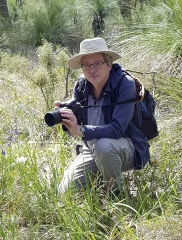 Mark undertaking field work for his research projects in Warwick Bushland (Photo by Karen Clarke). 