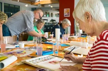 People enjoying an art class