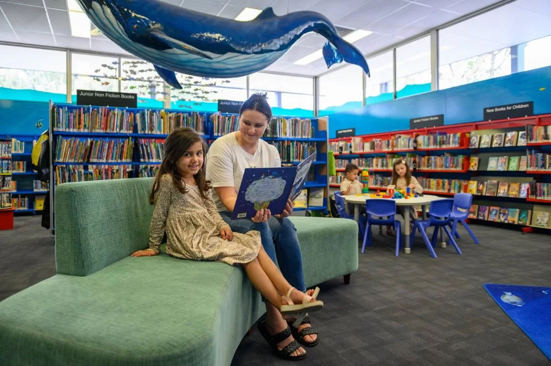 Photo of people enjoying a library event