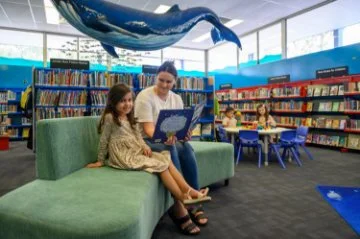 Photo of people enjoying a library event