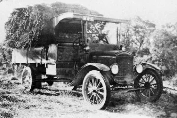 William Tapping carting reeds for rope making ca. 1920