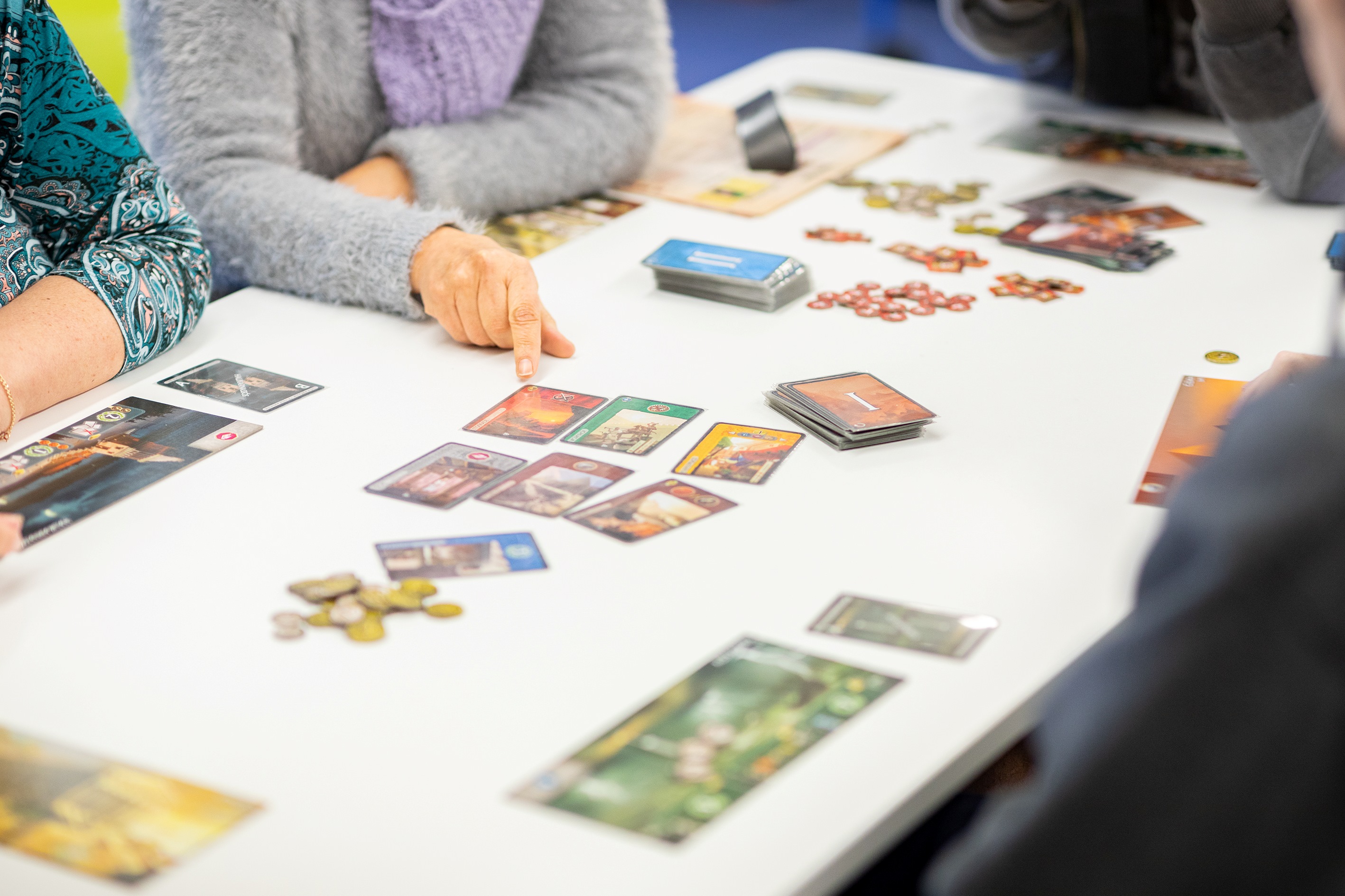 People playing a board game